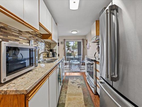 107-2035 Baron Road, Kelowna, BC - Indoor Photo Showing Kitchen With Double Sink