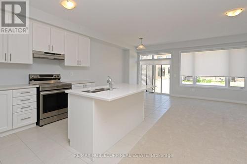 33 Keenan Street, Kawartha Lakes, ON - Indoor Photo Showing Kitchen With Double Sink