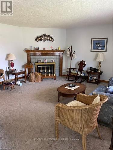 Imported from itso - 111 Fath Avenue, Aylmer (Ay), ON - Indoor Photo Showing Living Room With Fireplace