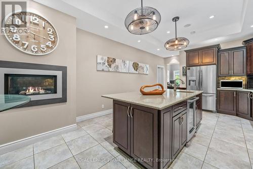 17B Hughes Lane, Tweed, ON - Indoor Photo Showing Kitchen With Fireplace