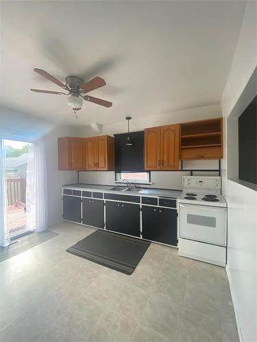 217 Miles Street, Glenboro, MB - Indoor Photo Showing Kitchen With Double Sink