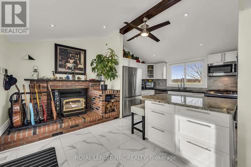 817 Lakeshore Road, Haldimand, ON - Indoor Photo Showing Kitchen With Fireplace