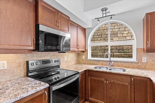 301-7922 Okanagan Landing Road, Vernon, BC - Indoor Photo Showing Kitchen With Double Sink