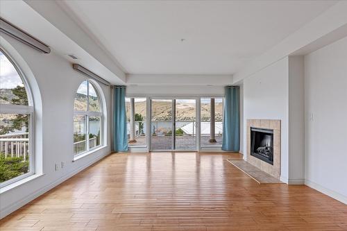 301-7922 Okanagan Landing Road, Vernon, BC - Indoor Photo Showing Living Room With Fireplace