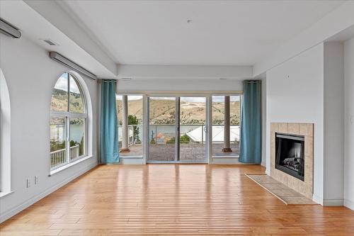 301-7922 Okanagan Landing Road, Vernon, BC - Indoor Photo Showing Living Room With Fireplace