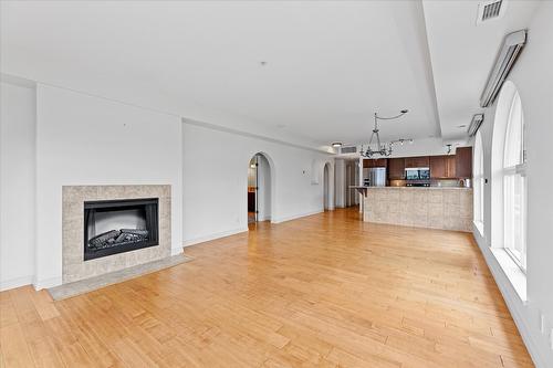 301-7922 Okanagan Landing Road, Vernon, BC - Indoor Photo Showing Living Room With Fireplace