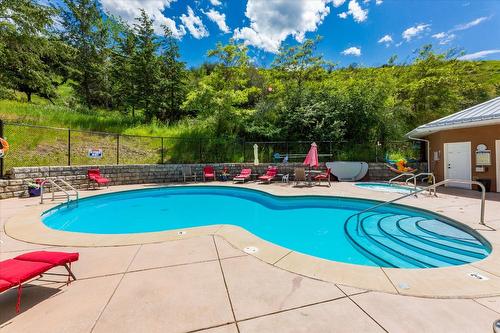 301-7922 Okanagan Landing Road, Vernon, BC - Outdoor With In Ground Pool With Backyard