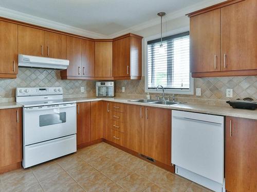 Cuisine - 224 Rue De Langloiserie, Rosemère, QC - Indoor Photo Showing Kitchen With Double Sink