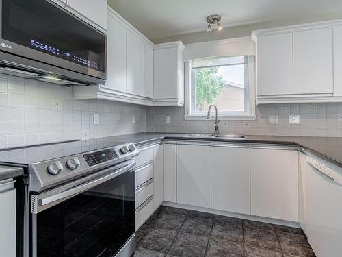 Cuisine - 1841 Rue Des Ballades, L'Ancienne-Lorette, QC - Indoor Photo Showing Kitchen With Double Sink