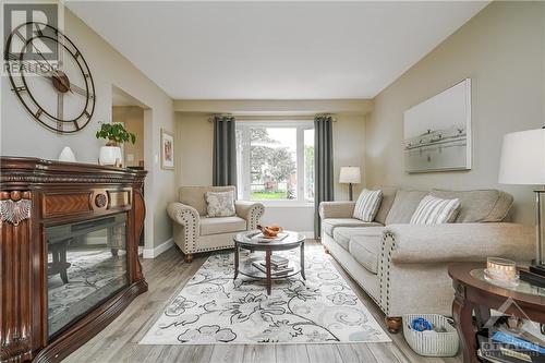 31 Spearman Lane, Kanata, ON - Indoor Photo Showing Living Room With Fireplace