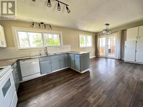 1791 78Th Avenue, Grand Forks, BC - Indoor Photo Showing Kitchen With Double Sink