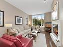 215-999 Burdett Ave, Victoria, BC  - Indoor Photo Showing Living Room With Fireplace 