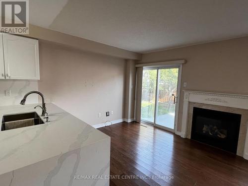 7315 Lowville Heights, Mississauga, ON - Indoor Photo Showing Living Room With Fireplace