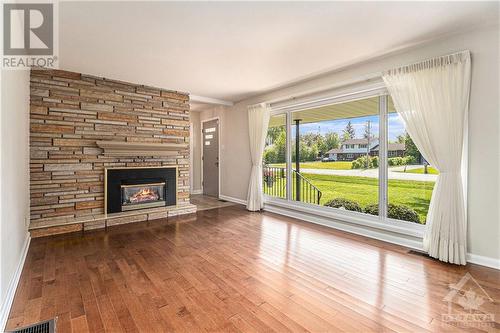 54 Wabalac Drive, Arnprior, ON - Indoor Photo Showing Living Room With Fireplace