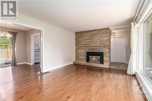 54 Wabalac Drive, Arnprior, ON - Indoor Photo Showing Living Room With Fireplace