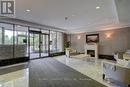 628 - 3 Greystone Walk Drive, Toronto (Kennedy Park), ON  - Indoor With Fireplace 