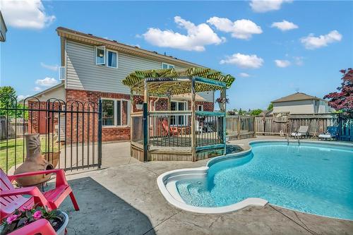 96 Highland Boulevard, Caledonia, ON - Outdoor With In Ground Pool