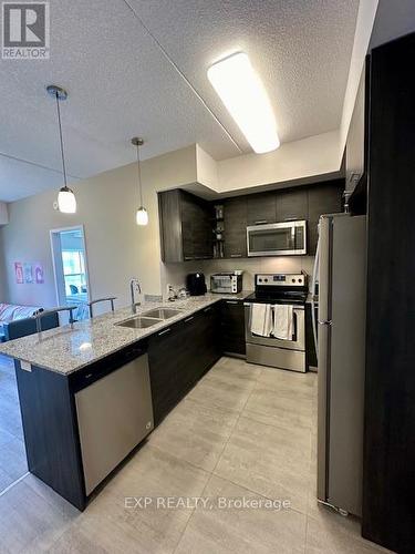 516 - 251 Hemlock Street, Waterloo, ON - Indoor Photo Showing Kitchen With Stainless Steel Kitchen With Double Sink