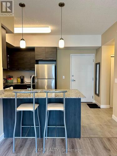 516 - 251 Hemlock Street, Waterloo, ON - Indoor Photo Showing Kitchen With Stainless Steel Kitchen