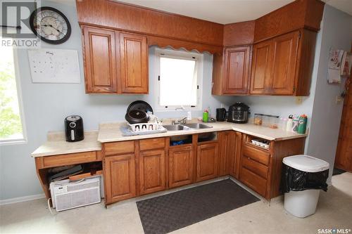 9704 97Th Drive, North Battleford, SK - Indoor Photo Showing Kitchen With Double Sink