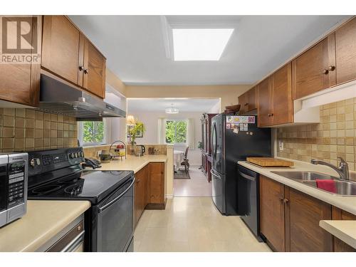 1035 Bernard Avenue Unit# 201, Kelowna, BC - Indoor Photo Showing Kitchen With Double Sink