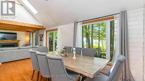 75059 Elmslie Drive, Bluewater (Bayfield), ON - Indoor Photo Showing Dining Room With Fireplace