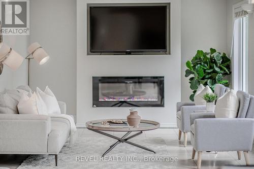 31 Shelley Drive, Kawartha Lakes, ON - Indoor Photo Showing Living Room With Fireplace