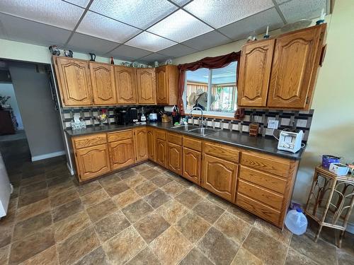 7926 Riverside Drive, Grand Forks, BC - Indoor Photo Showing Kitchen With Double Sink