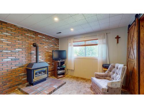 824 14Th Street S, Cranbrook, BC - Indoor With Fireplace