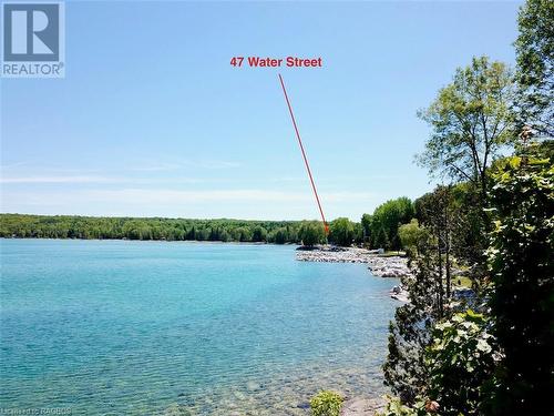 Crystal clear waters at the base of Hope Bay. - 47 Water Street, Northern Bruce Peninsula, ON - Outdoor With Body Of Water With View