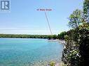 Crystal clear waters at the base of Hope Bay. - 47 Water Street, Northern Bruce Peninsula, ON  - Outdoor With Body Of Water With View 