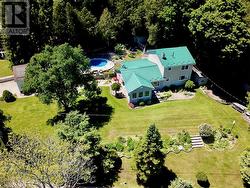 Over a 1/2 acre of property that is landscaped to perfection. - 