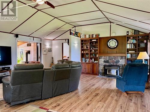 Featuring vaulted ceilings and crisp finishes. - 47 Water Street, Northern Bruce Peninsula, ON - Indoor Photo Showing Other Room With Fireplace