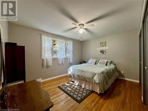 Main floor features an ample size master bedroom. - 47 Water Street, Northern Bruce Peninsula, ON - Indoor Photo Showing Bedroom