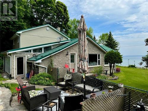 While private, the pool side area offers Georgian Bay views. - 47 Water Street, Northern Bruce Peninsula, ON - Outdoor With Deck Patio Veranda With Exterior