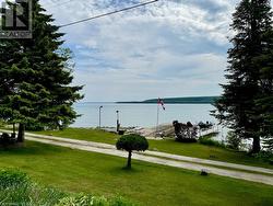 Now let's have a closer look at the 167 ft of private Georgian Bay waterfront. - 