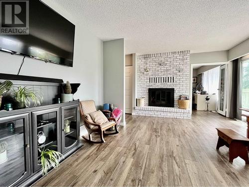 699 N Fifth Avenue, Williams Lake, BC - Indoor Photo Showing Living Room With Fireplace