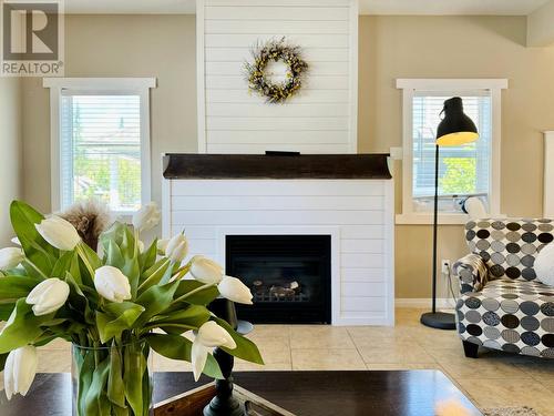 406 Crowne Rise Forest, Kimberley, BC - Indoor Photo Showing Living Room With Fireplace