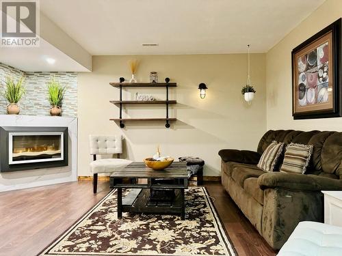 406 Crowne Rise Forest, Kimberley, BC - Indoor Photo Showing Living Room With Fireplace