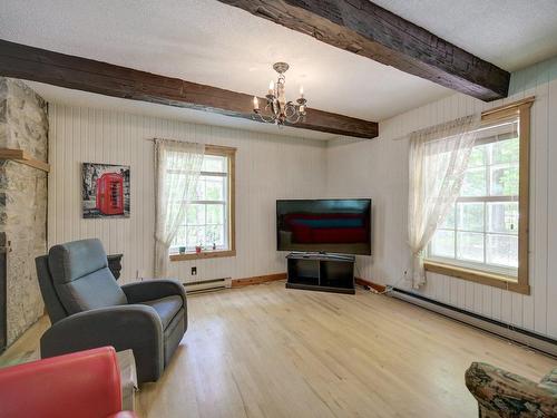 Living room - 6107 Ch. Vincent-Massey, Rawdon, QC - Indoor Photo Showing Living Room With Fireplace