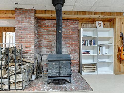 Family room - 161 Rg Point-Du-Jour N., Lavaltrie, QC - Indoor Photo Showing Other Room With Fireplace