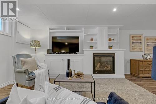 32 Concession Street E, Clarington, ON - Indoor Photo Showing Living Room With Fireplace