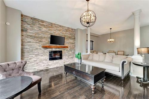 236 Penny Lane, Stoney Creek, ON - Indoor Photo Showing Living Room With Fireplace