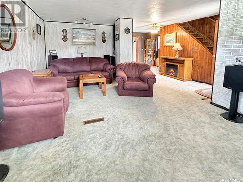 604 Sussex Avenue, Esterhazy, SK - Indoor Photo Showing Living Room With Fireplace