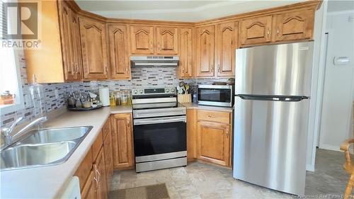 16 First Street, Quispamsis, NB - Indoor Photo Showing Kitchen With Double Sink