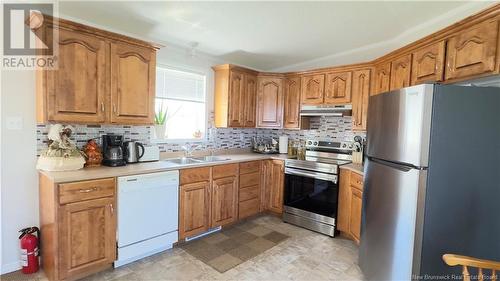 16 First Street, Quispamsis, NB - Indoor Photo Showing Kitchen With Double Sink