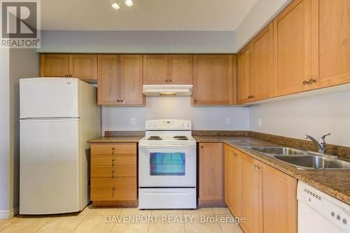 106 - 70 First Street, Orangeville, ON - Indoor Photo Showing Kitchen With Double Sink