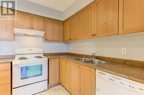 106 - 70 First Street, Orangeville, ON - Indoor Photo Showing Kitchen With Double Sink