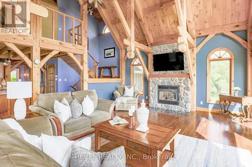 223 Washburn Island Road, Kawartha Lakes, ON - Indoor Photo Showing Living Room With Fireplace