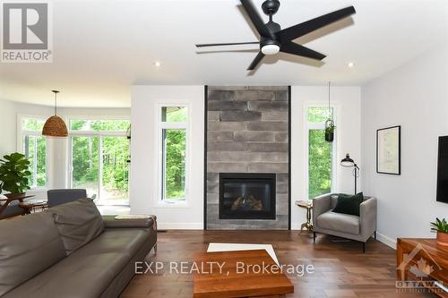 1579 Rollin Road, Clarence-Rockland, ON - Indoor Photo Showing Living Room With Fireplace